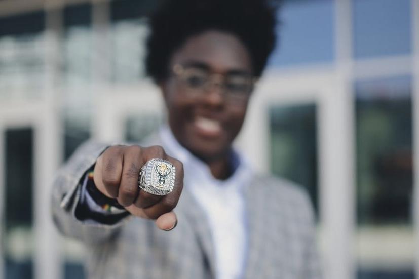 Ayanna Crenshaw '23 shows off a ring she got as a sales intern with the Milwaukee Bucks.